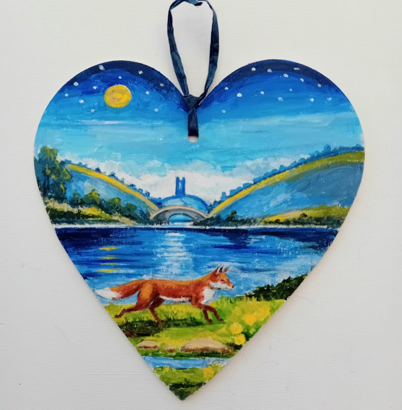 Lakeside Fox by moonlight on a wooden heart shape