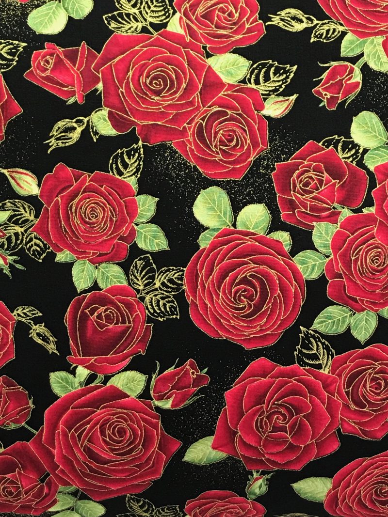 Front detail of red rose floral cushion cover with green leaves on a black background, 18 inch 45cm square, zipped and lined decorative pillow case