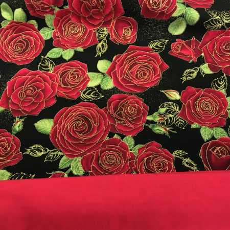 Lining detail of red rose floral cushion cover with green leaves on a black background, 18 inch 45cm square, zipped and lined decorative pillow case