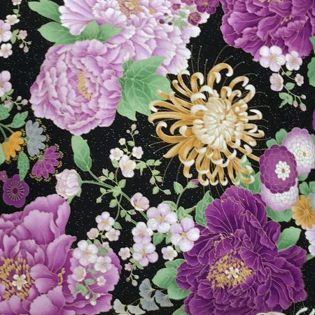 Detail of black cushion cover with purple peonies and golden chrysanthemum floral pattern, 18 inch lined with zip