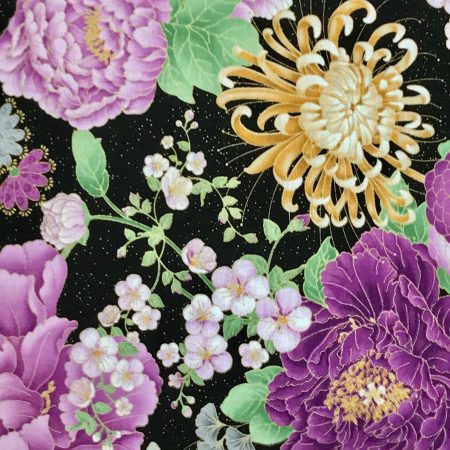 Detail of black cushion cover with purple peonies and golden chrysanthemum floral pattern, 18 inch lined with zip
