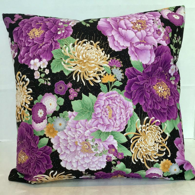 Back of black cushion cover with purple peonies and golden chrysanthemum floral pattern, 18 inch lined with zip