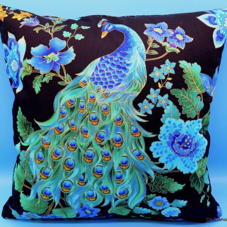 Front of a blue peacock floral cushion cover with vibrant bird design on the front and feather pattern on the reverse