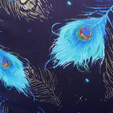 Reverse detail of blue peacock floral cushion cover with vibrant bird design on the front and feather pattern on the reverse