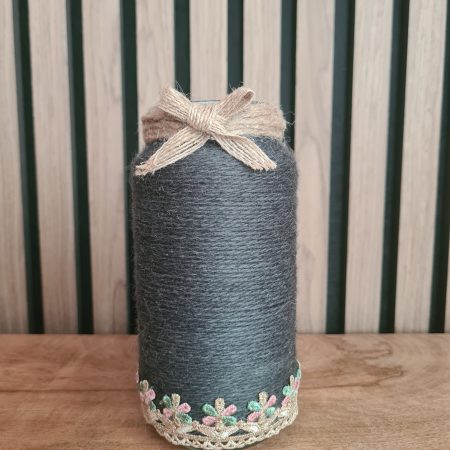 Upcycled glass jar wrapped in dark grey yarn with lace and jute trim