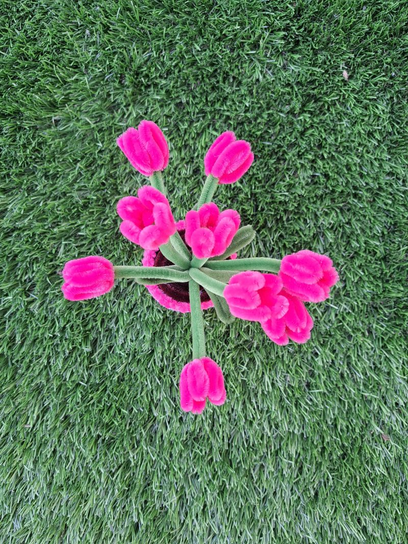 Handmade faux pink tulips crafted from pipe cleaners in a charming pot