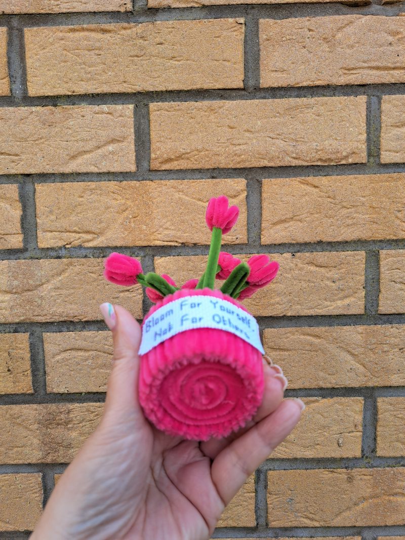 Handmade faux pink tulips crafted from pipe cleaners in a charming pot
