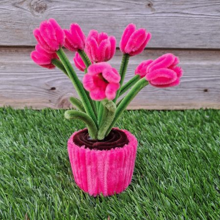 Handmade faux pink tulips crafted from pipe cleaners in a charming pot