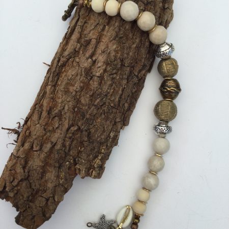 Cream coral and metallic necklace and bracelet