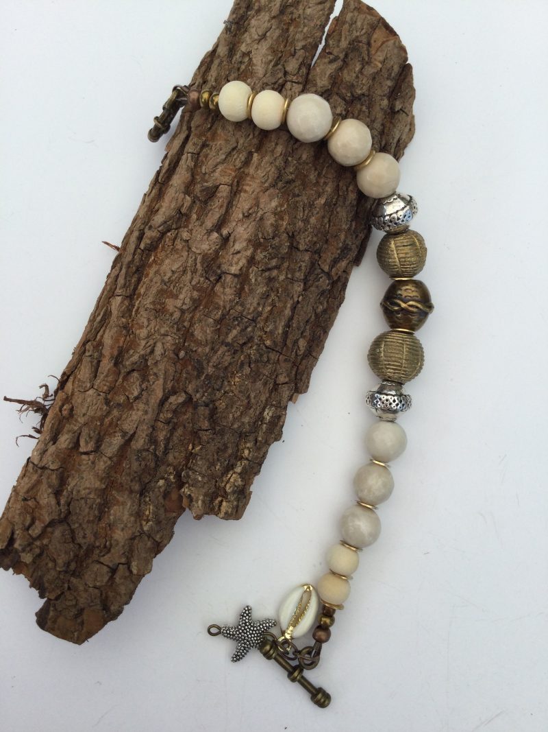 Cream coral and metallic necklace and bracelet