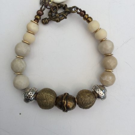 Cream coral and metallic necklace and bracelet