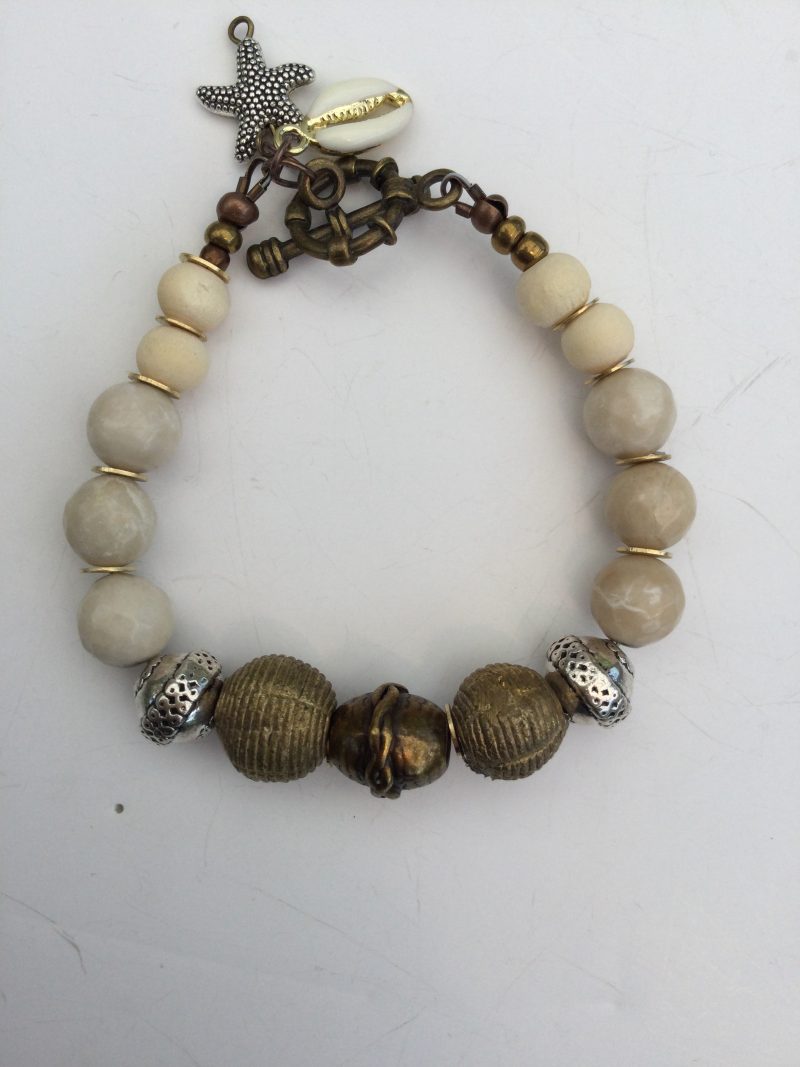 Cream coral and metallic necklace and bracelet