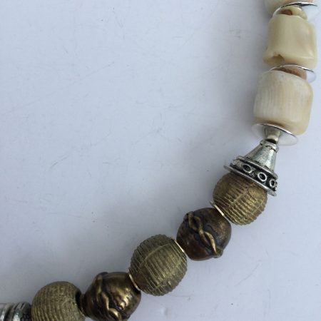 Cream coral and metallic necklace and bracelet