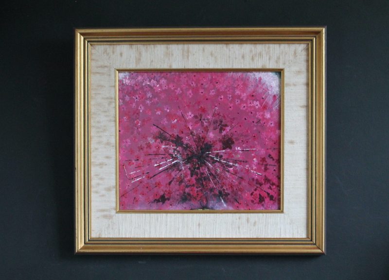 Abstract art depicting a pink ring piece