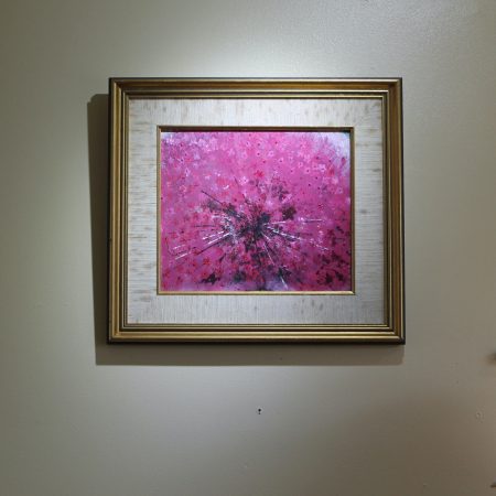 Abstract art depicting a pink ring piece