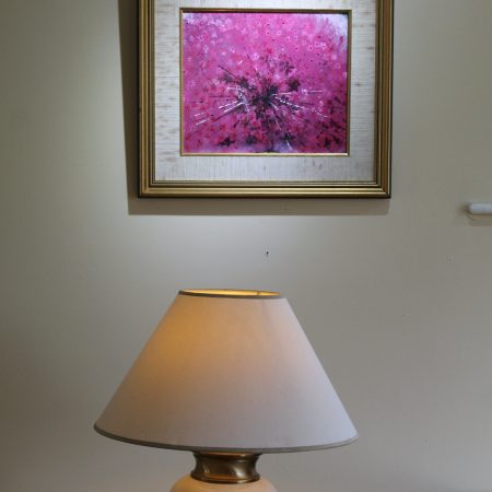 Abstract art depicting a pink ring piece