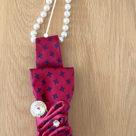 Upcycled one-of-a-kind red necktie accessory with bits of blue