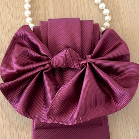Bow like one-of-a-kind, upcycled necktie necklace