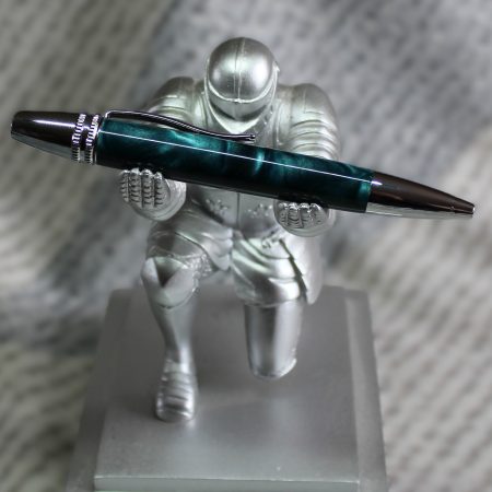 Premier twist ballpoint pen made from teal coloured acrylic