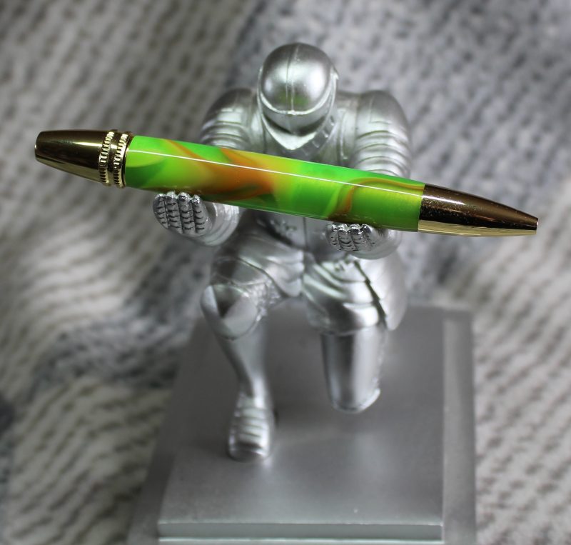Premier twist ballpoint pen made from green coloured acrylic