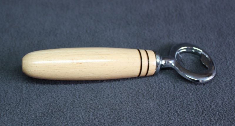 Bottle opener made from beech with a stainless steel opener