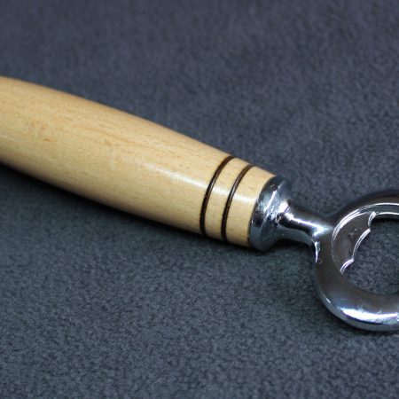 Bottle opener made from beech with a stainless steel opener