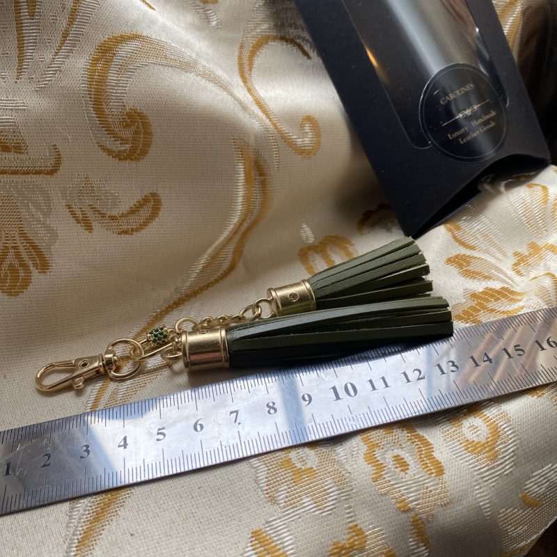 Absolutely stunning green bag charm or keyring brass and cubic zaconia imbelishment