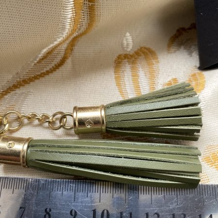 Absolutely stunning green bag charm or keyring brass and cubic zaconia imbelishment