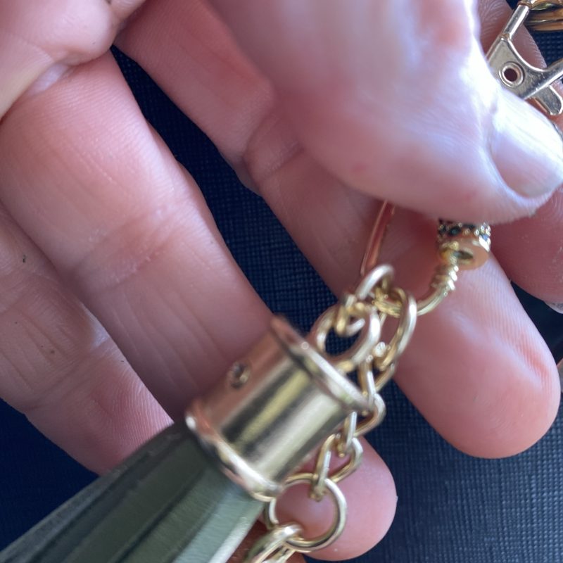 Absolutely stunning green bag charm or keyring brass and cubic zaconia imbelishment
