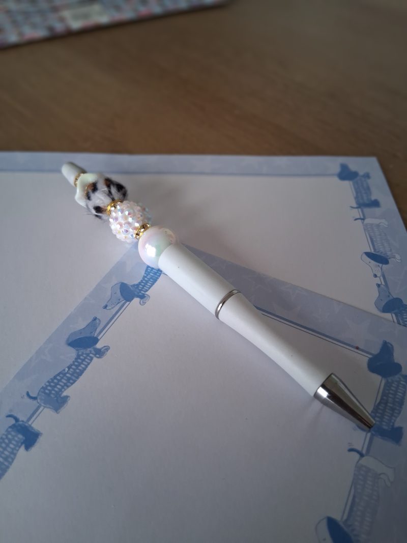 "Dolly" Handmade white pen.