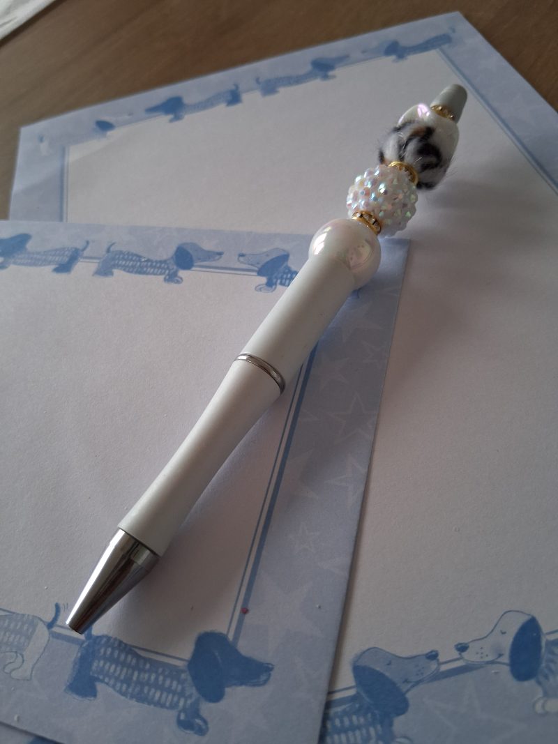 "Dolly" Handmade white pen.