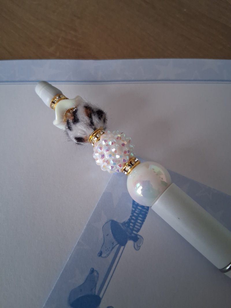 "Dolly" Handmade white pen.