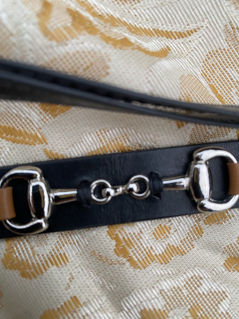 Black and brown leather snaffle dog collar