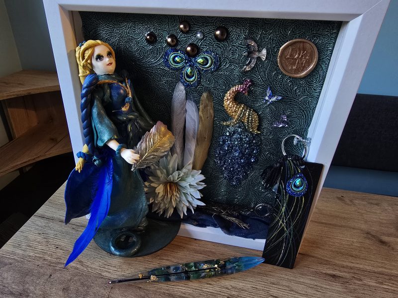 Emeraldire - Guardian of the peacock handmade clay model in a frame with resin pen and wooden bookmark set