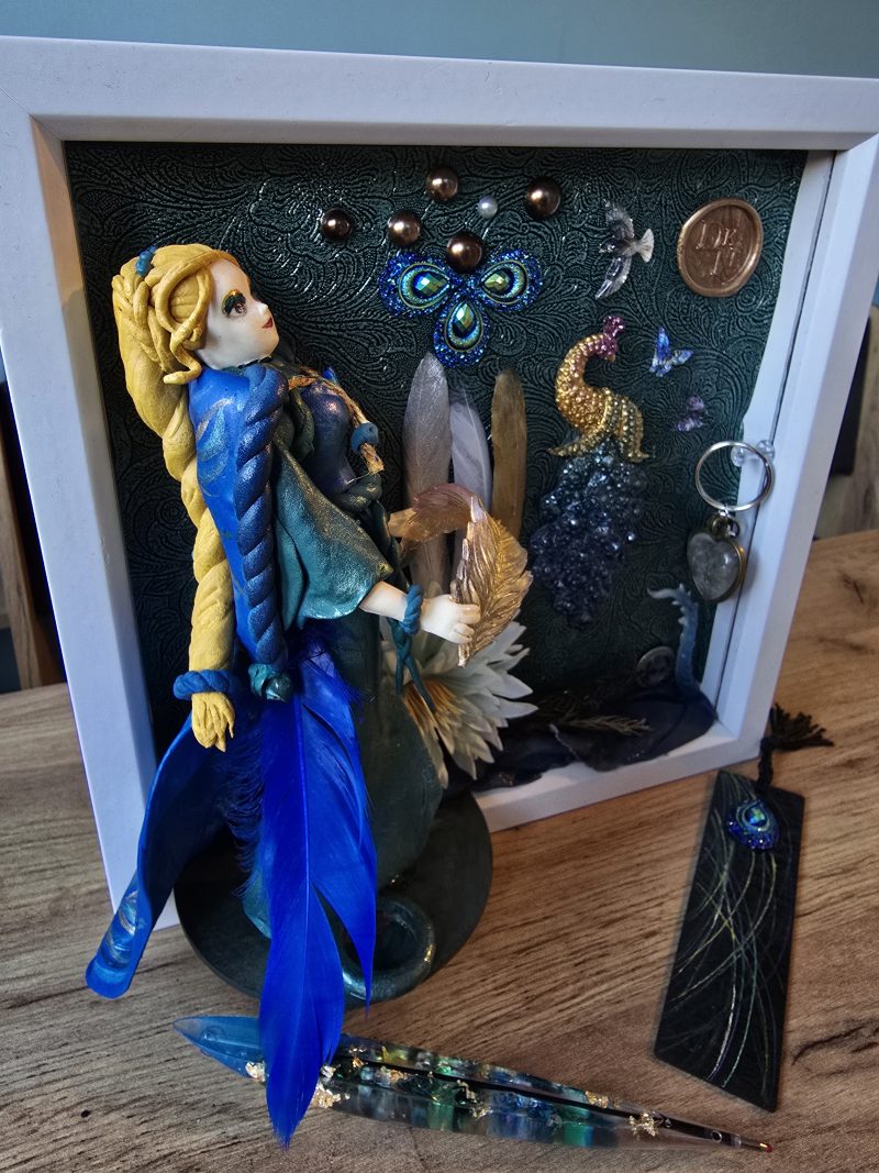 Emeraldire - Guardian of the peacock handmade clay model in a frame with resin pen and wooden bookmark set