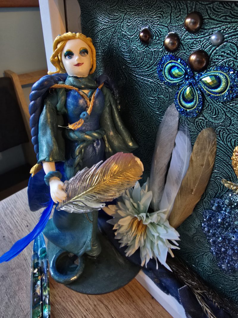 Emeraldire - Guardian of the peacock handmade clay model in a frame with resin pen and wooden bookmark set