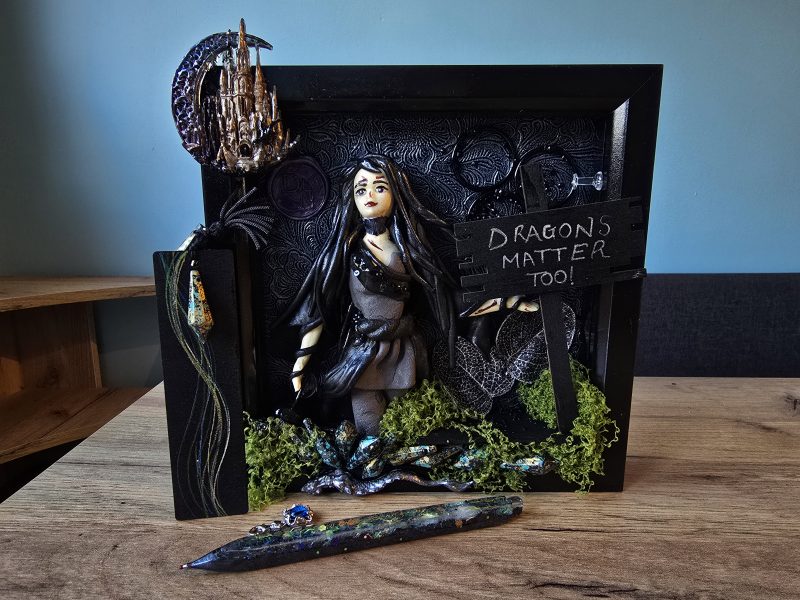 Narla - The Dragon Protector handmade clay model in a frame with resin pen and wooden bookmark set