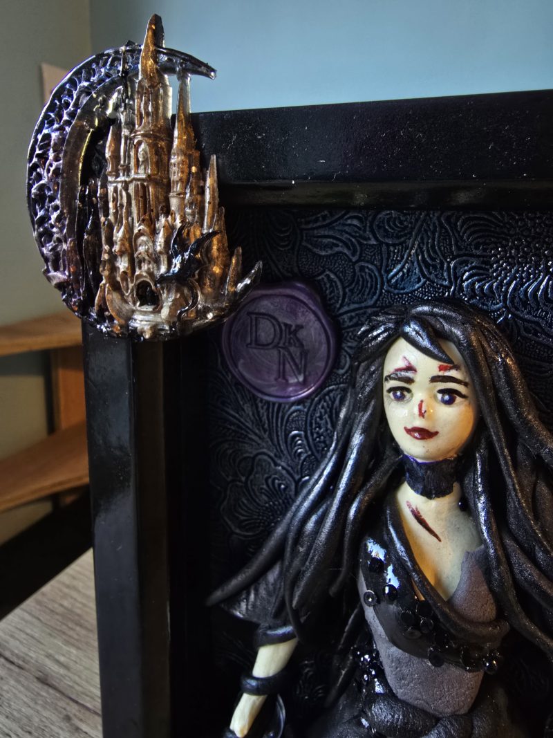 Narla - The Dragon Protector handmade clay model in a frame with resin pen and wooden bookmark set