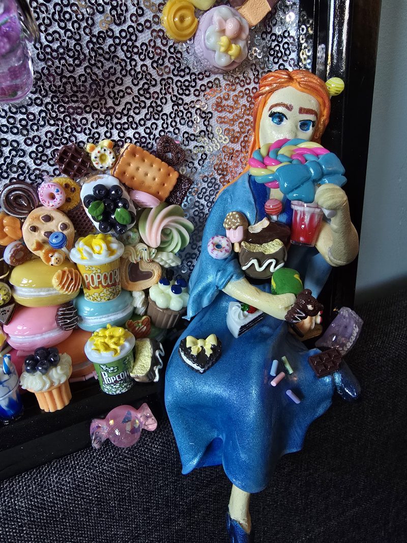 A glutton for punishment…and sweet things, handmade clay model in a frame with resin pen, bookmark and keyring set
