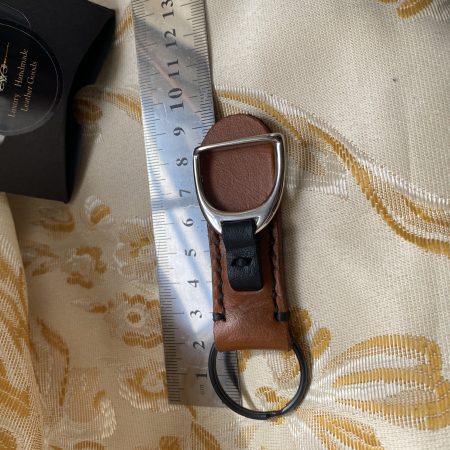 London tan and black leather stirrup key ring or bag charm