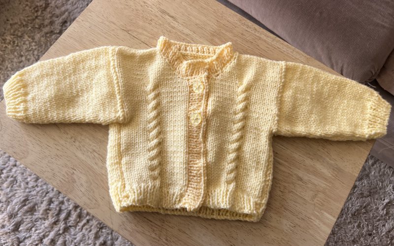 Hand knitted baby cardigan