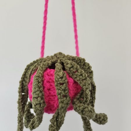 Handmade hanging crochet plant in a fushia pot