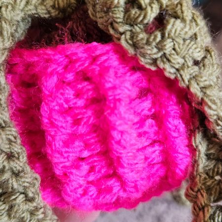 Handmade hanging crochet plant in a fushia pot