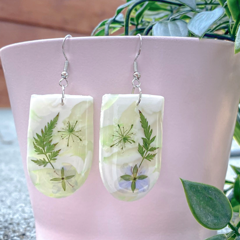 Handmade natural look single drop earrings with real foliage.