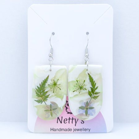 Handmade natural look single drop earrings with real foliage.