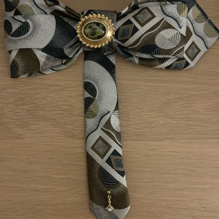 Handmade Bow in gray, brown, and green abstract geometric silk design.