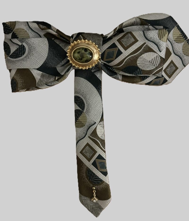 Handmade Bow in gray, brown, and green abstract geometric silk design.