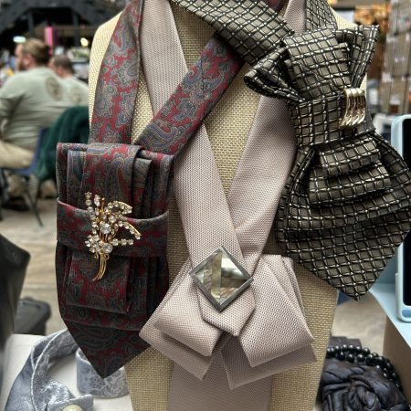 Stylish Handmade necktie accessory in a vintage-style burgundy paisley printed silk tie paired with a crystal floral brooch