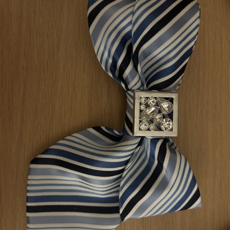 Elegant blue striped bow tie with a rhinestone accent.