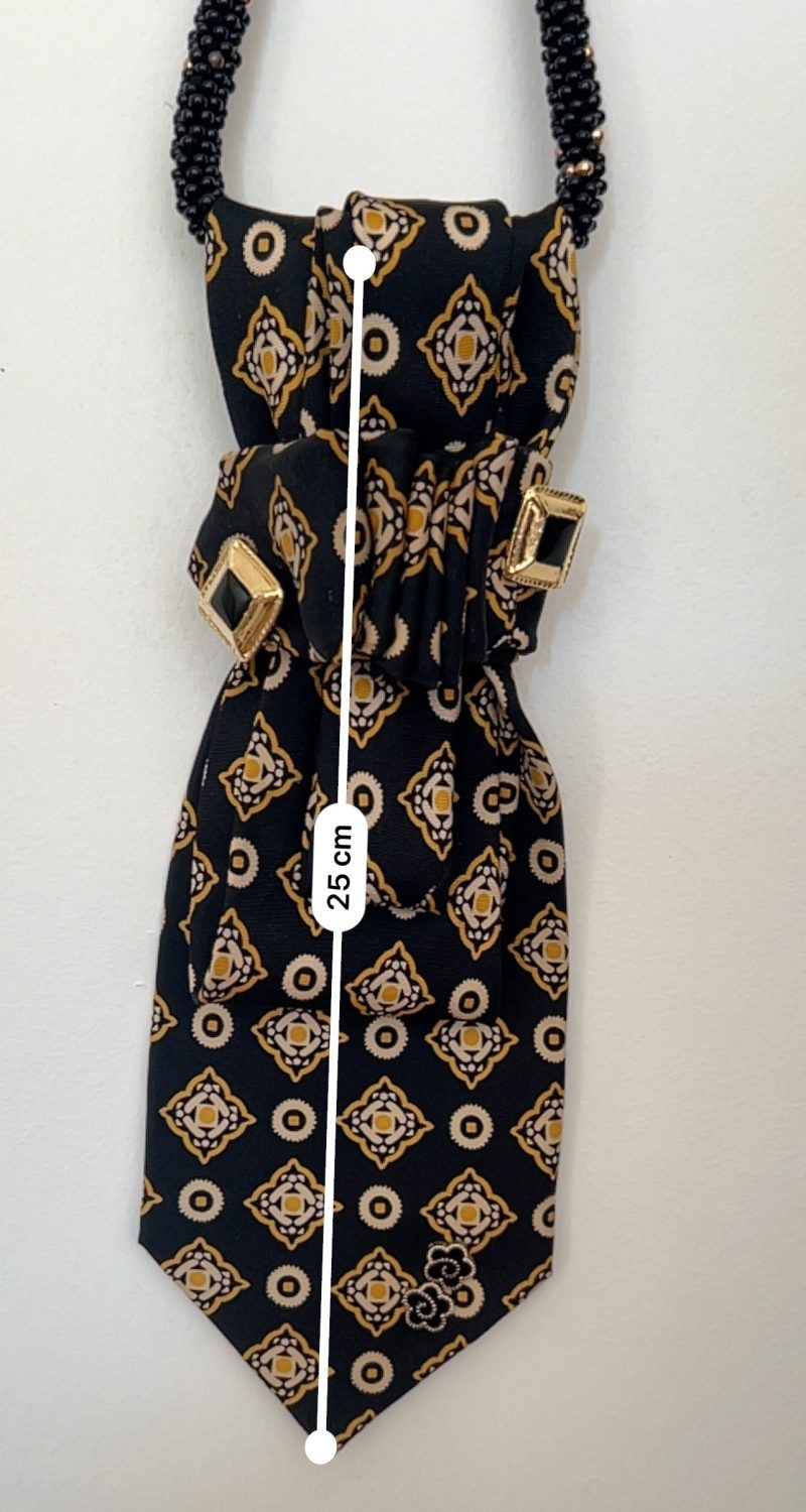 Handmade black silk necktie with a gold and white geometric pattern and decorative gold accents necktie.